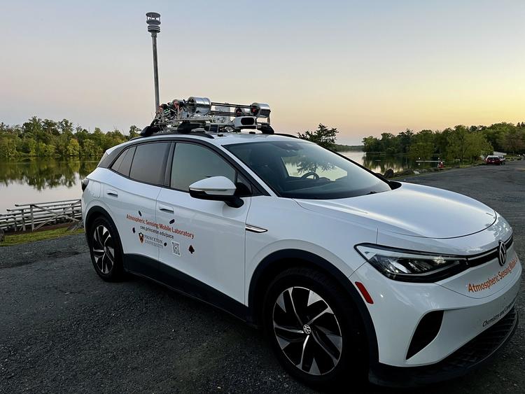 White vehicle with sensors on it. 
