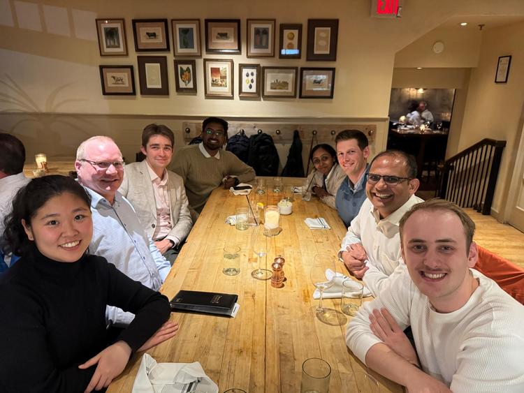 group of people at a dinner table